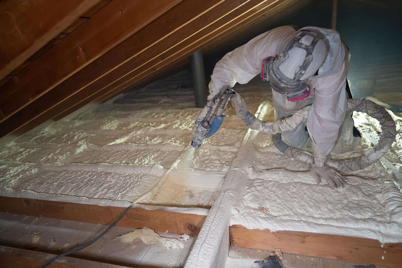 Attic air sealing with spray foam insulation, addressing air leaks and drafts in a Southfield home.