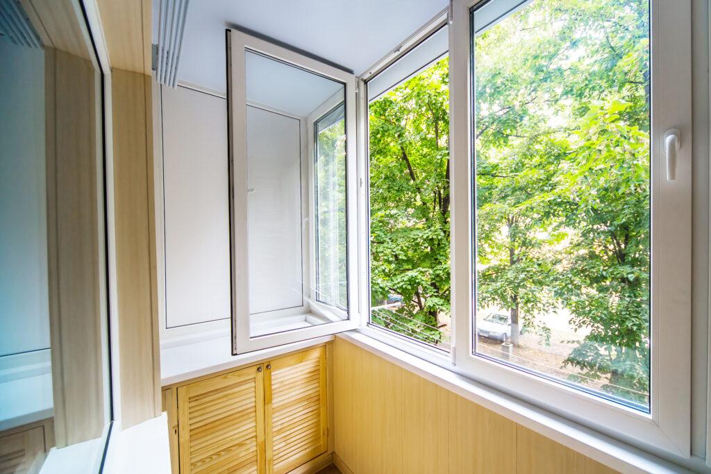 Energy-efficient windows and doors reducing drafts and heat loss in a Michigan home.